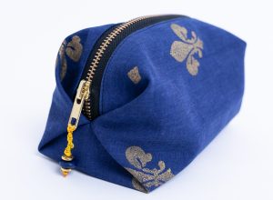 Blue and gold make up bag